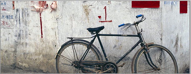Bike and Wall, From the Odyssey Travel to China Photo Series. Learn More >